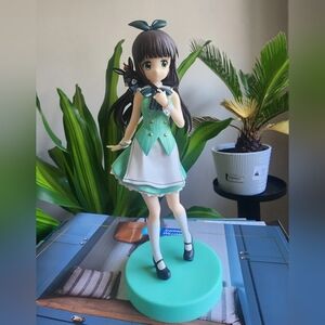 Anime Figure with Black Cat